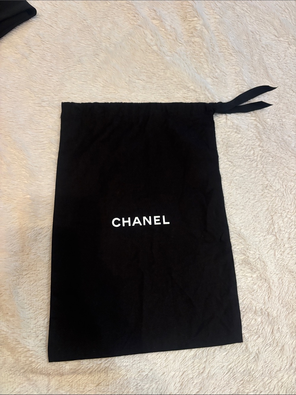 CHANEL Black Drawstring Pouch with White Logo